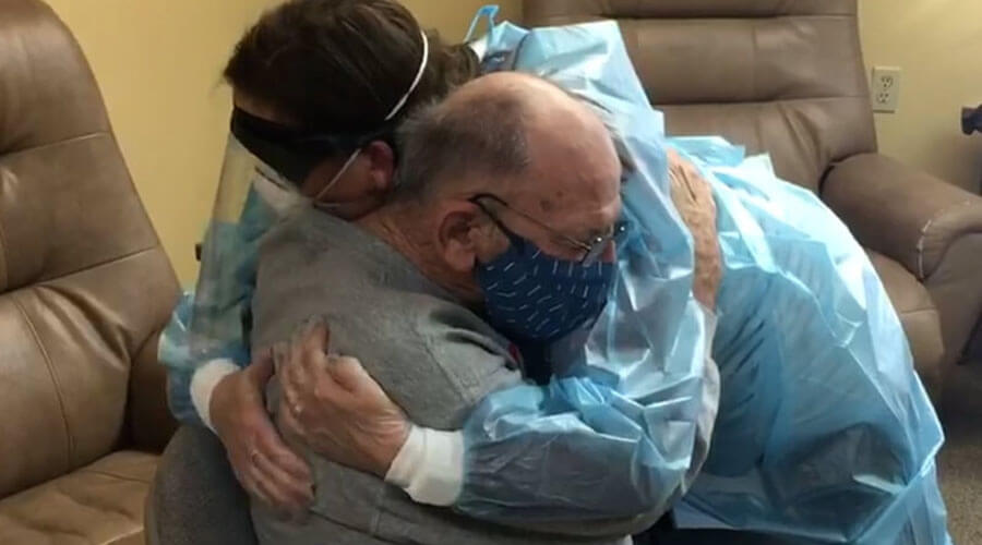 Simple hug becomes powerful embrace during reunion